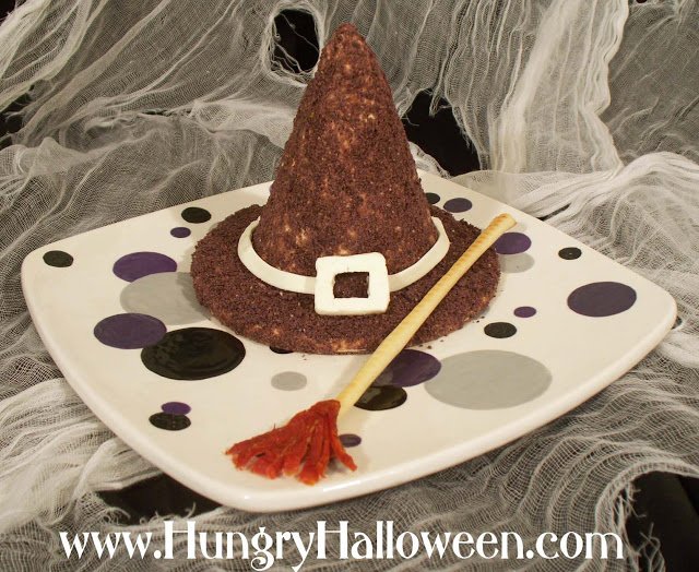 This Halloween Cheese Ball Witch Hat will be the center of attention at your party! This delicious appetizer puts a fin twist on your regular cheese ball!