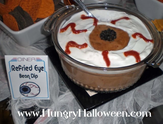 Looking for an appetizer to make to scare your friends? Try making one of these Halloween Appetizers Shaped Like Eyes... they're spooky and delicious!