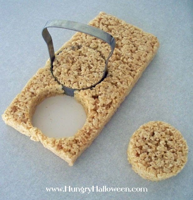 cutting rice krispie treats using a round biscuit cutter