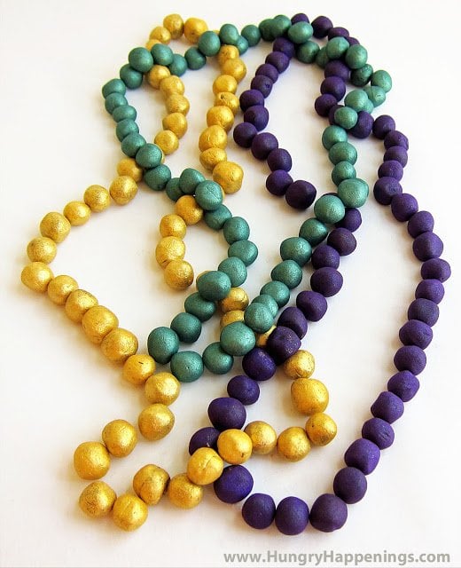 What is Mardi Gras more known for than the colorful beads! Get creative and make these Mardi Gras Chocolate Truffle Beads, you cant go wrong with this delicious dessert and its a simple recipe if you don't have much time on your hands!
