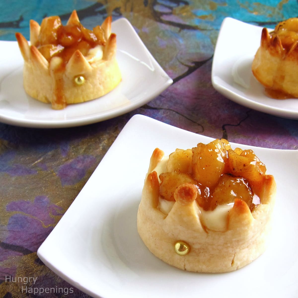 pastry crowns filled with cheesecake mousse and bananas foster.
