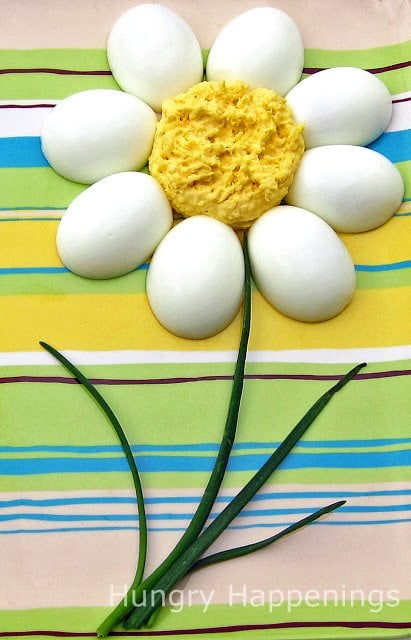 Deviled eggs are a favorite at any party, so be festive this Easter and make these Deviled Egg Daisies! It's a simple recipe that will have your guests thinking you spent hours in the kitchen!