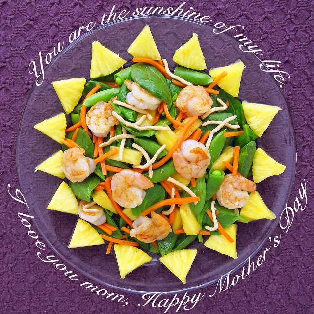 shrimp and spinach salad with sugar snap peas, pineapple, carrots, and chow mein noodles. 