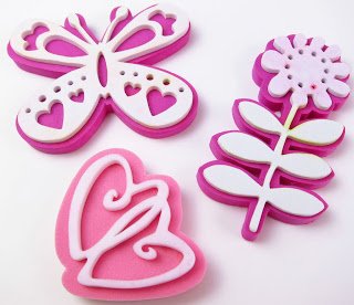 foam stamps of a butterfly, flower, and hearts. 