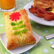homemade breakfast pastries stamped with a food color flower.