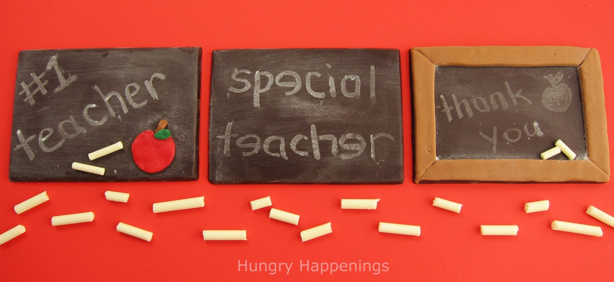 chocolate chalkboards with #1 teacher, Special Teacher, and Thank You printed on them using white chocolate chalk. 
