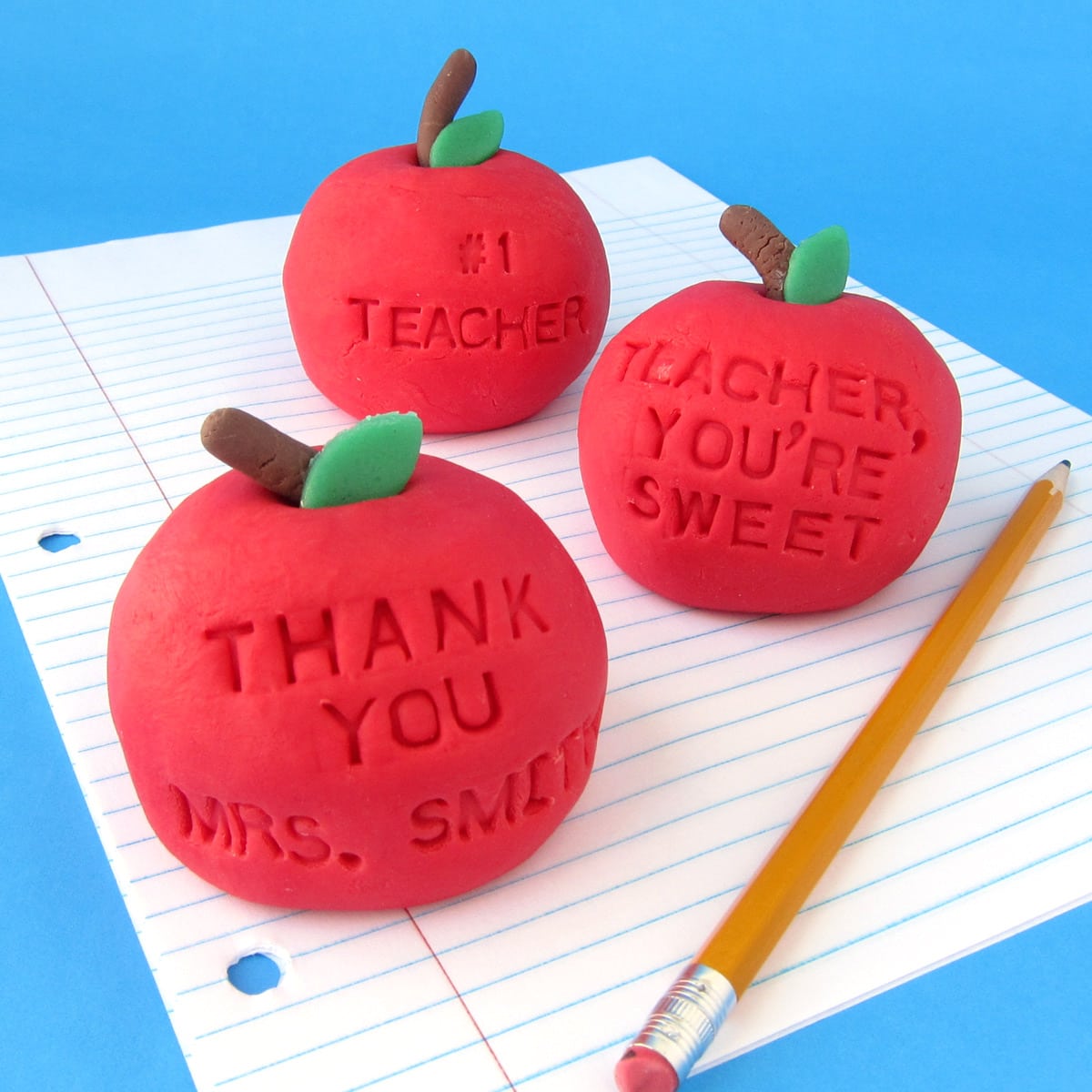 vanilla fudge apples stamped with special messages for teachers' gifts. 