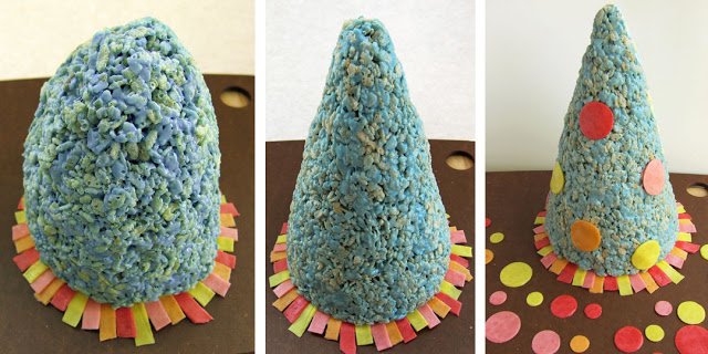 shaping a blue Rice Krispie treat cone into a birthday hat. 