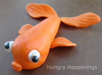 gold fish with edible googly eyes