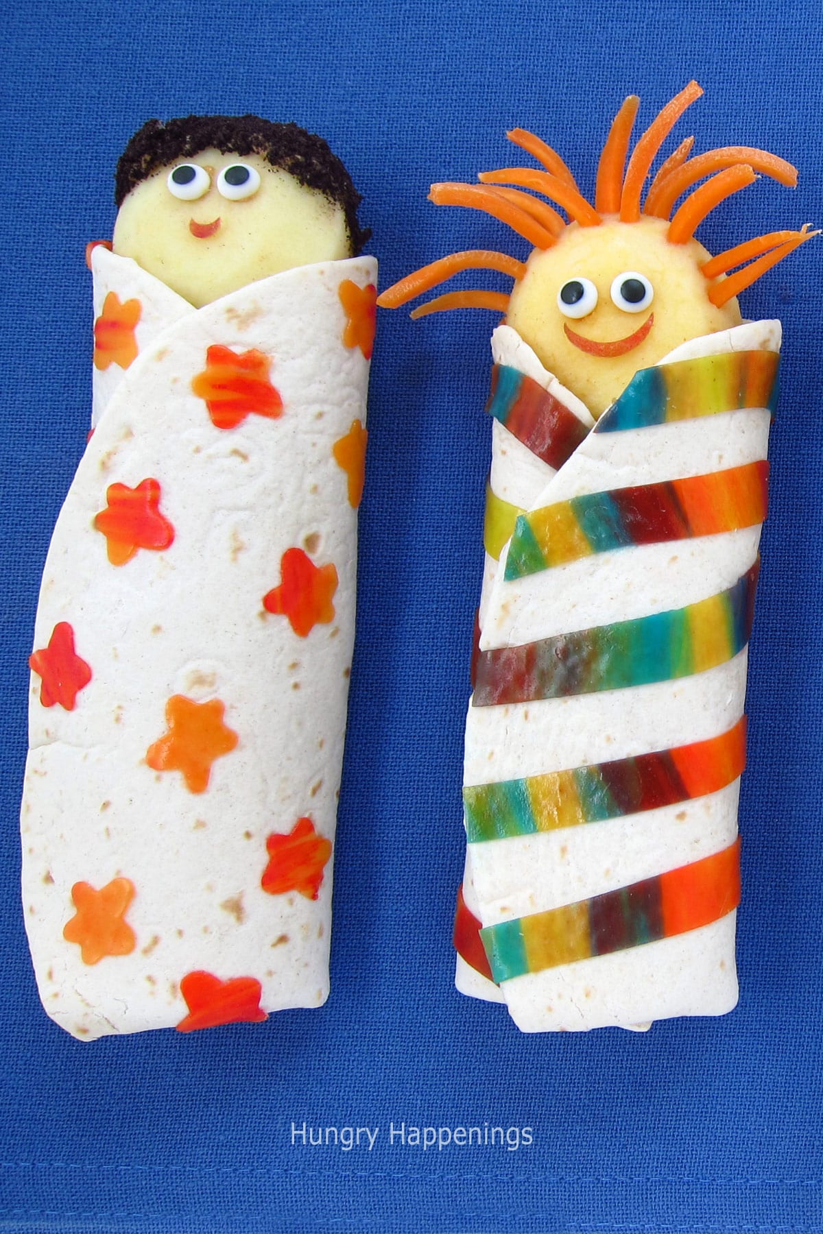 tortilla wrap sandwich that's decorated to look like a kid in a sleeping bag. 
