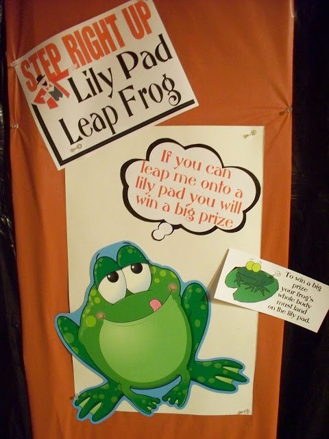 Lily pad leap frog game signs with a cute frog cut-out.