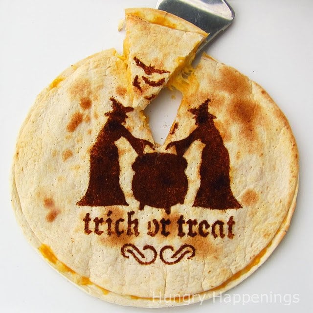 Make some of these Halloween Meal - Quesadillas Decorated Using A Stencil! They add such fun to a simple treat and are great appetizers for any event!
