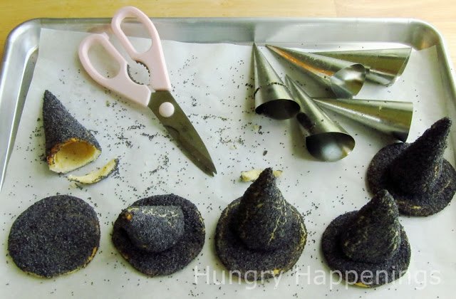 Hop on your broom and fly to the kitchen to cook up these Crescent Roll Witch Hats! They're so simple to make and make an amazing appetizer for your spooky party!