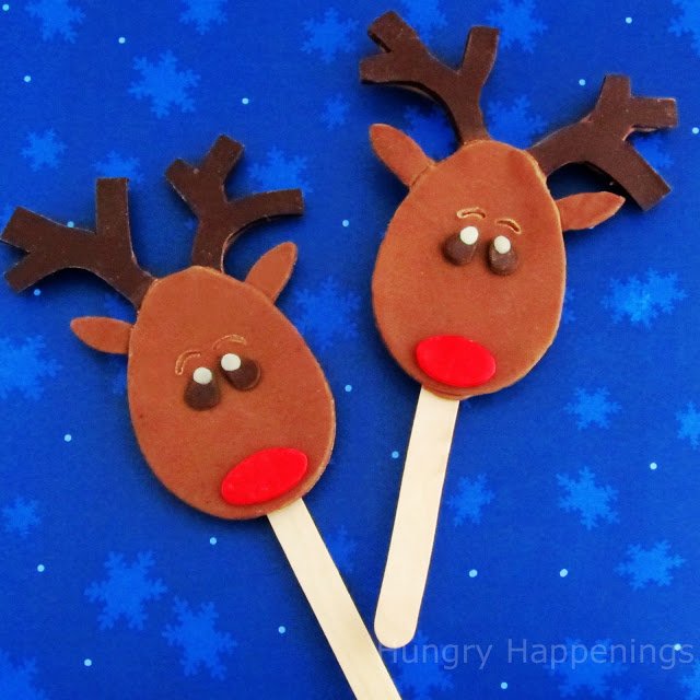 chocolate reindeer lollipops with modeling chocolate antlers.