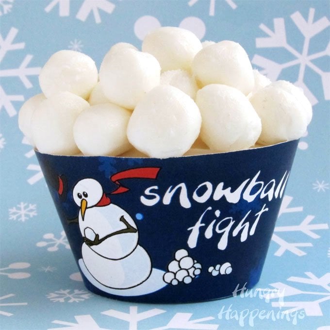 snowball fight cupcakes topped with frozen frosting snowballs. 