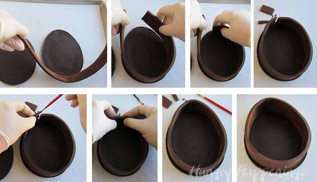 wrapping the modeling chocolate strip around the outer edge of the chocolate egg. 