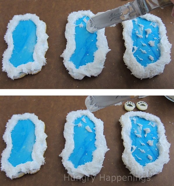 Adding white frosting waves to the ocean cookies. 
