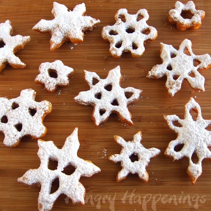 powdered sugar-coated snowflake-shaped doughnuts.