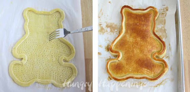 docking the puff pastry teddy bear using a fork and a baked bear-shaped puff pastry on a parchment paper-lined baking sheet