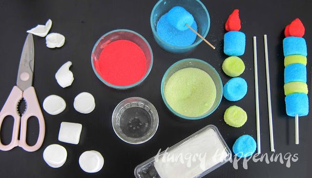 making sugar-coated birthday marshmallows that look like birthday candles using water, shortening, colored sugar, and marshmallows.