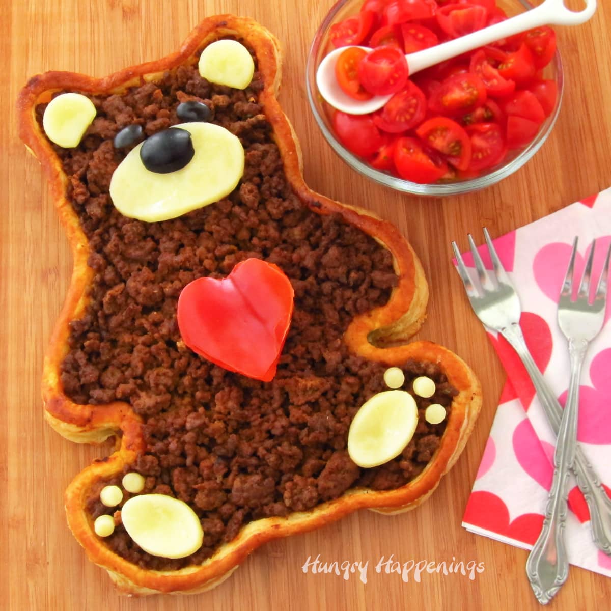 teddy bear-shaped taco tart with a puff pastry crust and taco fillings.