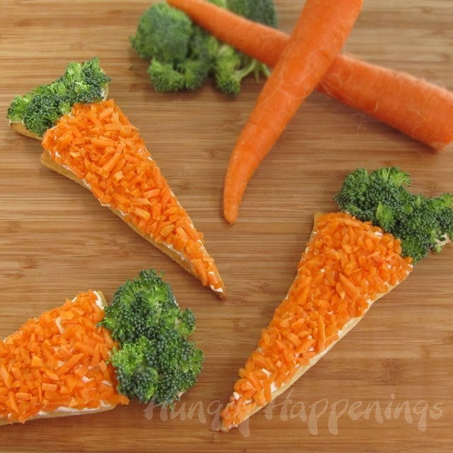 carrot-shaped veggie pizzas topped with carrots and broccoli