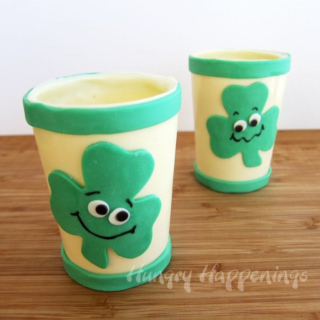 If you're looking for a sweet cold treat to have on St. Patrick's Day make these Smiling Shamrock Shakes! Your kids will love these cute treats and they're easy to make!