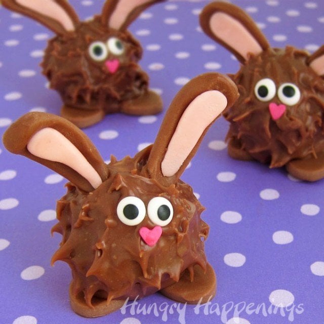 Peanut Butter Fudge Filled Chocolate Easter Bunnies couldn't be cuter. Each chubby little Easter treat is coated in milk chocolate ganache and is decorated with chocolate ears and feet.