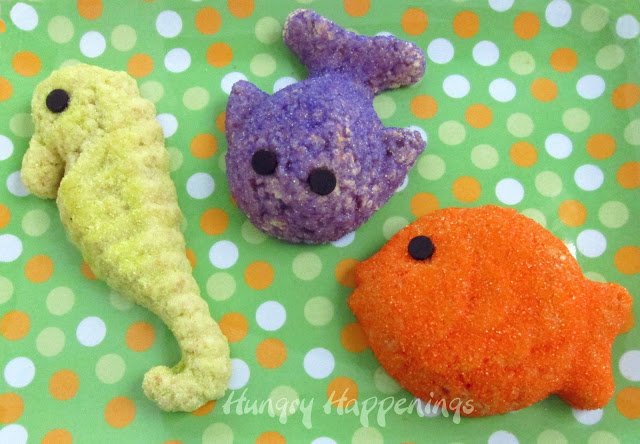 seahorse, whale, and fish rice krispie treats on a polka dot platter. 
