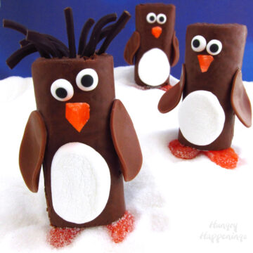 penguin cakes made with chocolate snack cakes like Hoho's or Swiss Rolls.