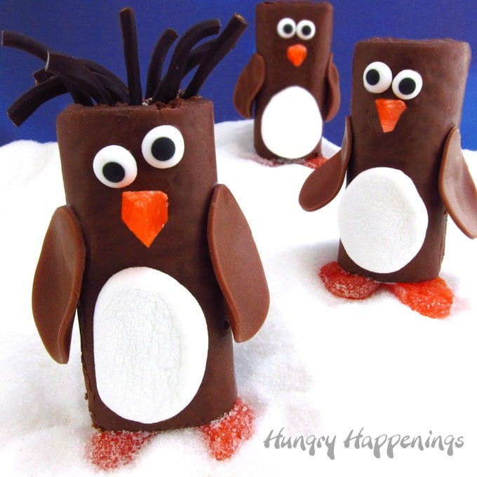 Turn store bought treats into adorably cute Snack Cake Penguins. They are super fun treats for kids.