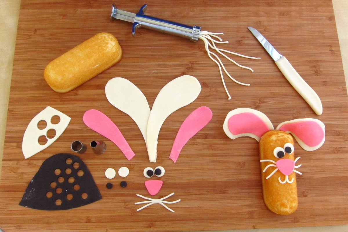 decorating bunny cakes using Twinkies and modeling chocolate.