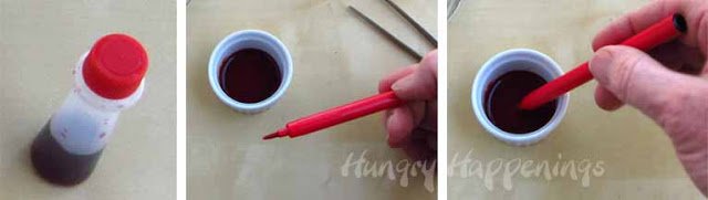 refilling a food coloring marker with red food coloring. 