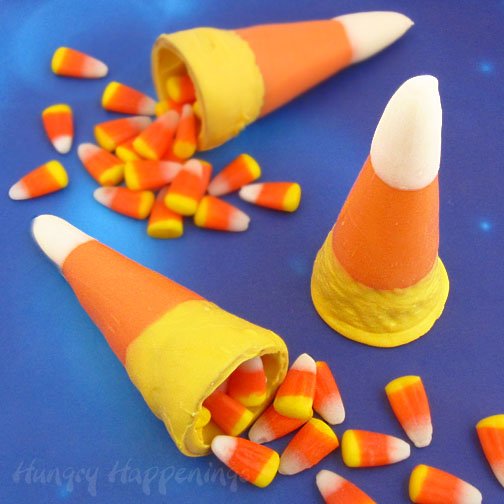 These Candy Corn Cones are an easy Halloween treat to make! They're a perfect last minute treat for your Halloween party and can be filled with whatever you like!
