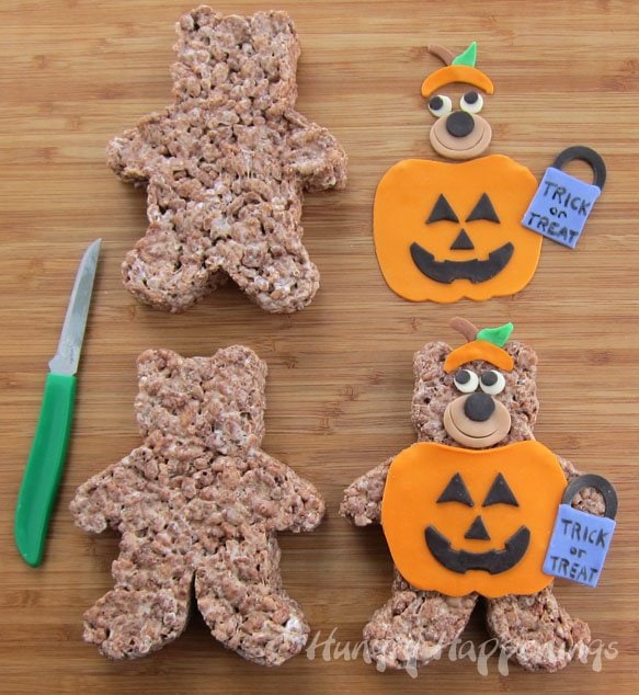 decorated chocolate rice crispy treat bears with modeling chocolate pumpkin costumes.
