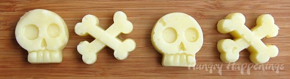 Mozzarella cheese skulls and cross-bones.