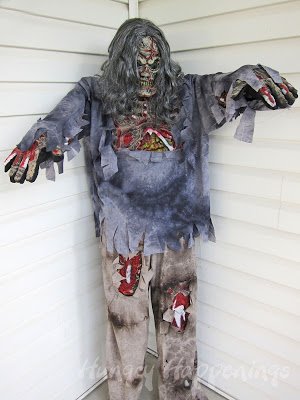 zombie prop on front porch for Halloween
