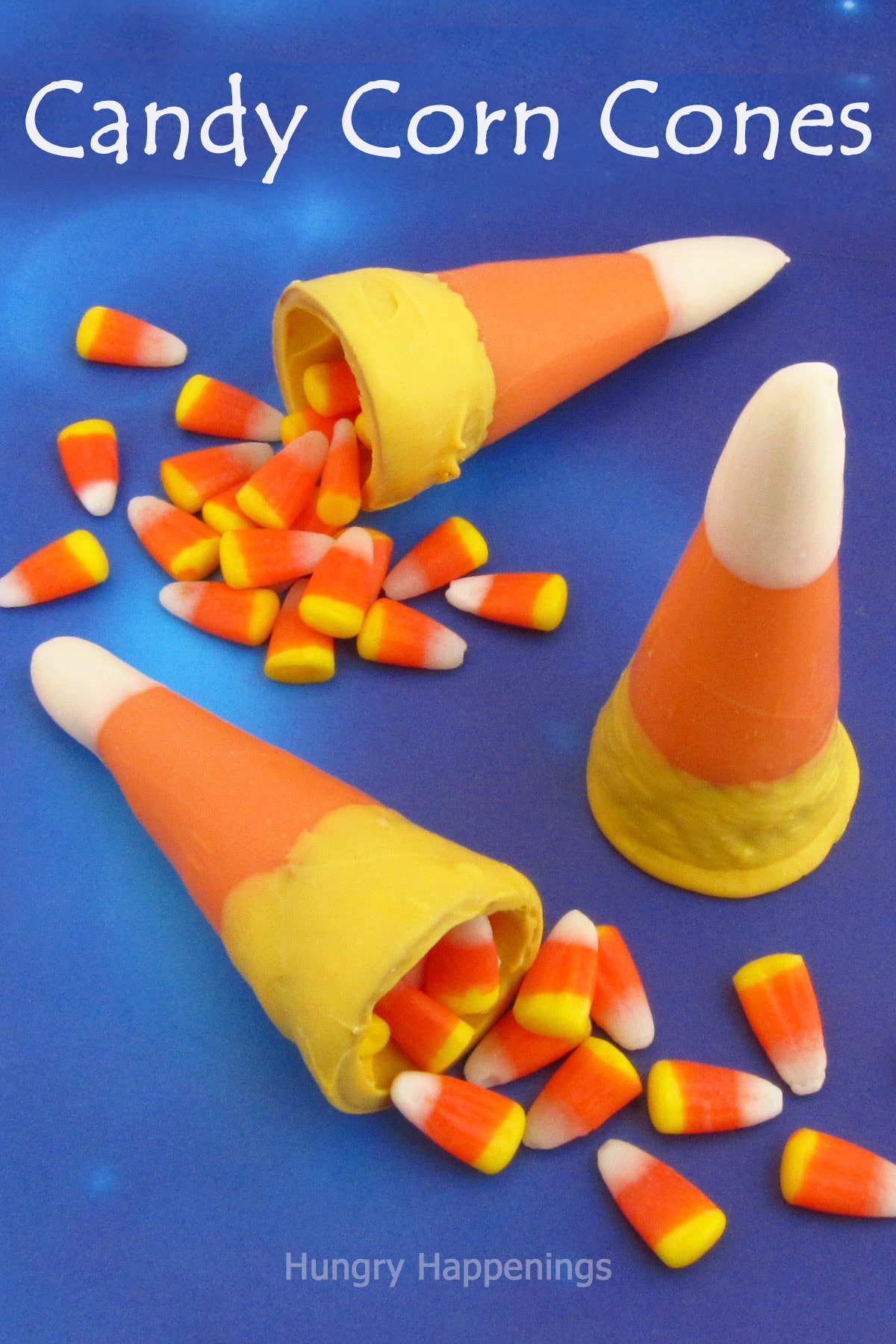 yellow, orange, and white striped sugar cone candy corn filled with candy corn. 
