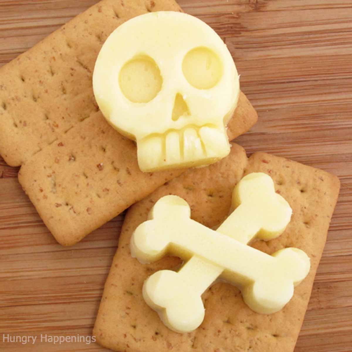 skull and crossbones cheese on crackers.