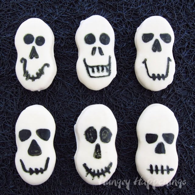 skull cookies with various faces. 