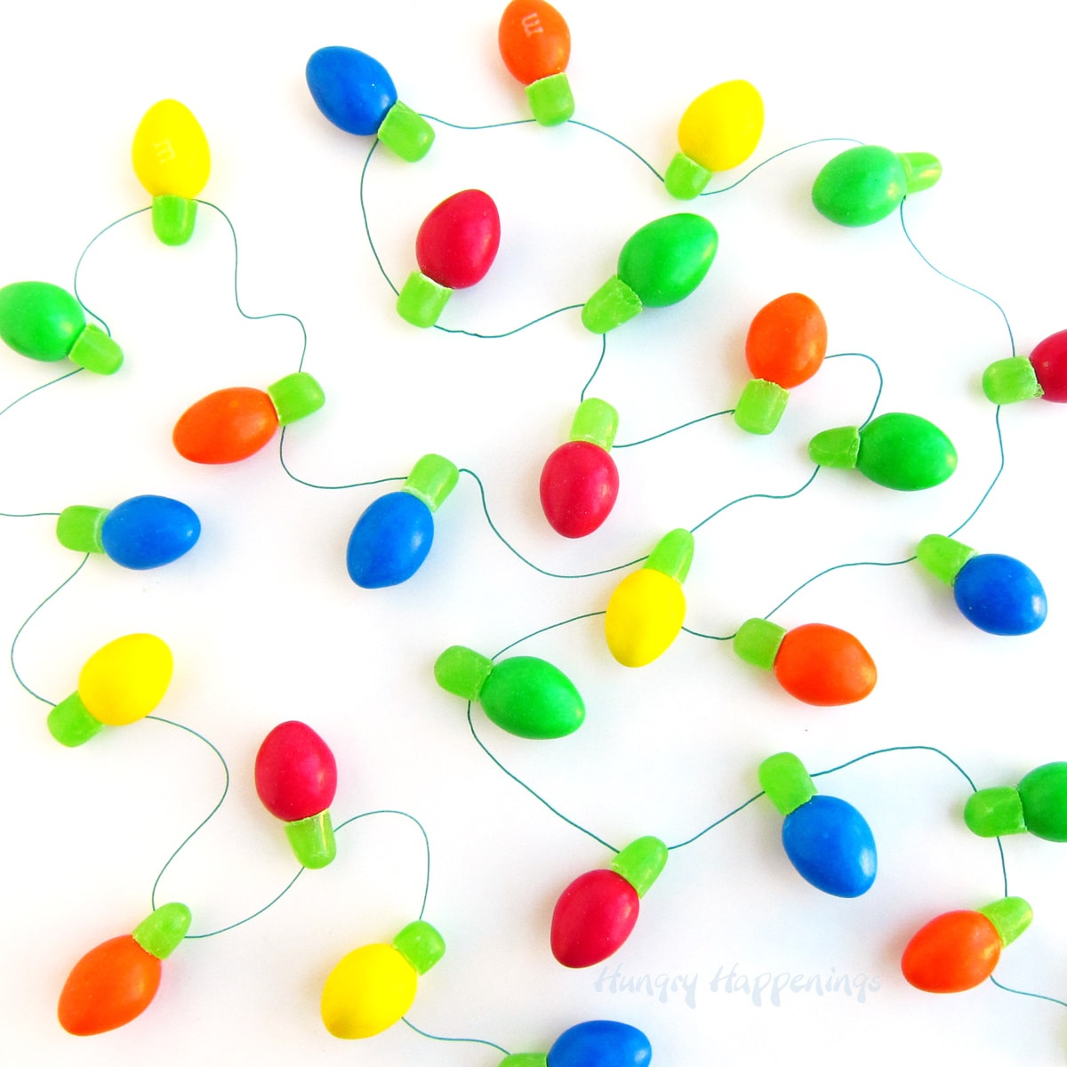 candy Christmas lights made with almond M&M's and green Mike and Ike candies. 