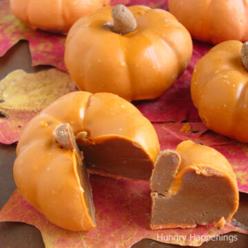 chocolate caramel pumpkins coated in orange candy melts.