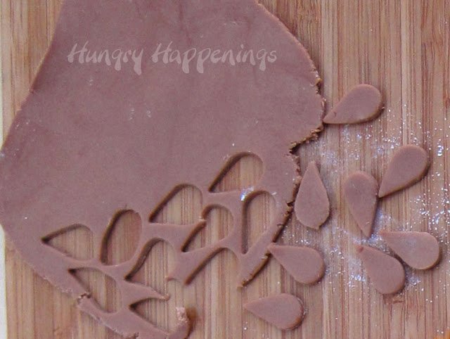 light brown modeling chocolate cut into teardrops. 
