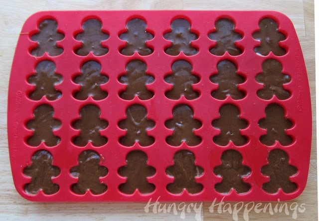 gingerbread silicone mold filled with milk chocolate gingerbread truffles. 
