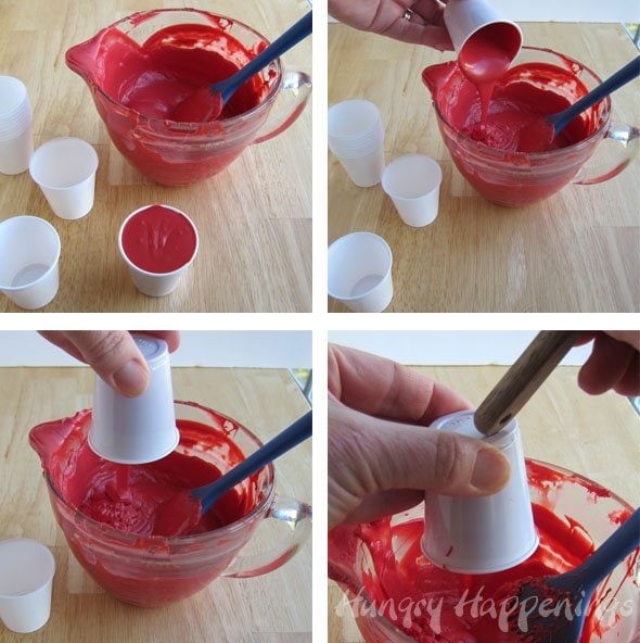 making red candy cups using plastic cups and red candy melts. 
