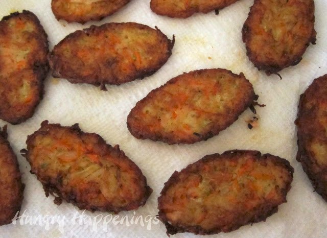 drain zucchini fritters on paper towels