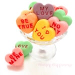 conversation heart fudge candies imprinted with "be mine," "my love", "love," "be true," and more