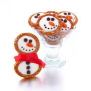 Snowman Pretzels made with white-chocolate pretzel rings.