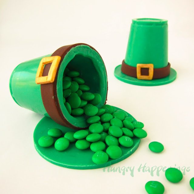 These Candy Leprechaun Hats filled with Sweet Surprises are the perfect treat for your St. Patrick's Day Party! They are simple and easy to customize with your favorite candies!
