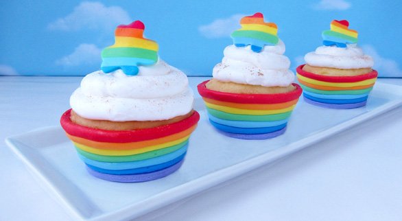 You can't have a pot of gold without a rainbow, so make these adorable Rainbow Fondant Cupcake Cups for St. Patrick's Day! They are completely edible and will spice up your plain cupcakes!